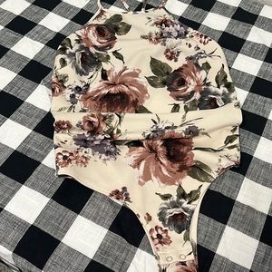 New , never use Súper Mega Sexy bodysuit size L